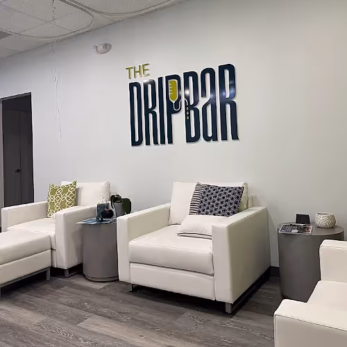 Bright lounge area featuring natural light and comfortable seating for IV therapy